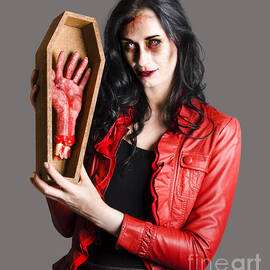 Zombie Woman with Coffin and Severed Hand by Jorgo Photography