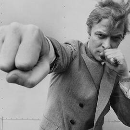 Michael Caine Throwing A Punch by Stephan C Archetti