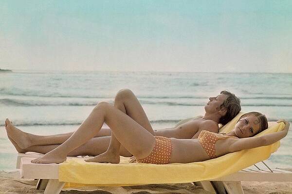 Couple Relaxing on the Beach Wall Art