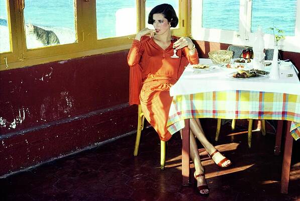Woman in Red Dress by the Sea Photograph