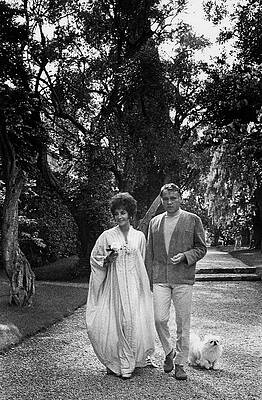 Couple Walking in a Garden Photograph