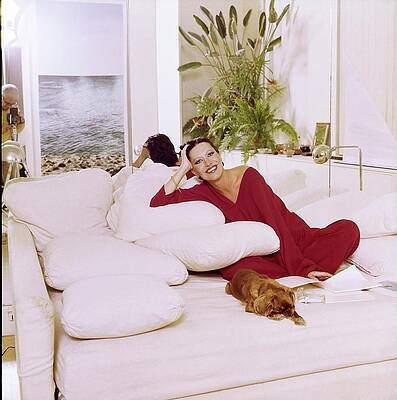 Dog Photograph - Elsa Peretti Wearing Halston Pajamas #1 by Horst P. Horst