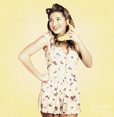 Wall Art featuring the photograph Funny Pin-up Model In Conversation On Banana Phone by Jorgo Photography