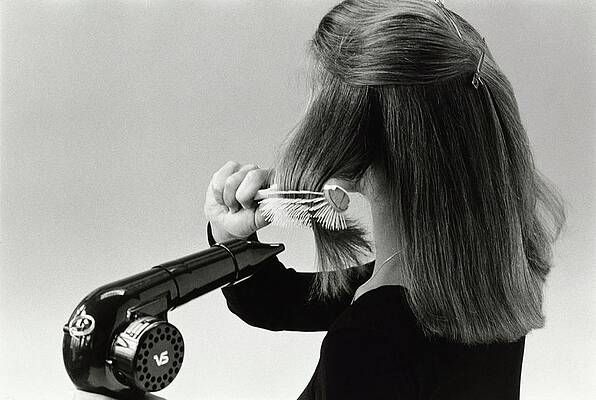Monochrome Photograph - Model Blow Drying Hair #1 by Mike Reinhardt
