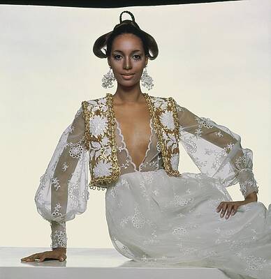 Black Background Wall Art featuring the photograph Model Wearing Oscar De La Renta #1 by Gianni Penati