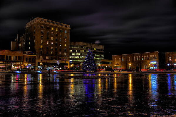 Reflection Photograph - Wausau After Dark At Christmas by Dale Kauzlaric