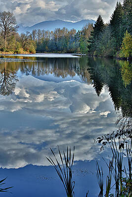 Serene Lake with Cloud Reflections Photograph