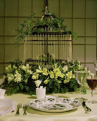 Fork Wall Art featuring the photograph A Birdcage In The Middle Of A Table by Wiliam Grigsby