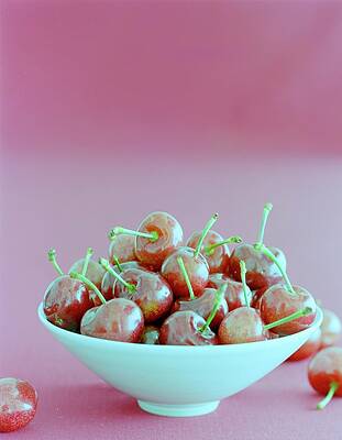 Bowl Wall Art featuring the photograph A Bowl Of Cherries by Romulo Yanes