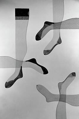 Wall Art featuring the photograph A Collage Of Stockings by Herbert Matter