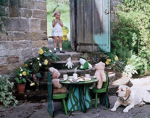 Stuffed Animal Wall Art featuring the photograph A Dog Sitting Next To Two Teddy Bears Having by Ernst Beadle