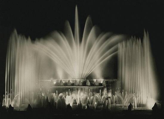 Illuminate Photograph - A Fountain At Monte Carlo Beach by John McMullin