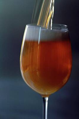 Wine Glass Wall Art featuring the photograph A Glass Of Beer by Romulo Yanes