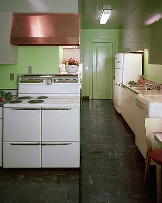 Illuminate Photograph - A Green Kitchen by Constantin Joffe