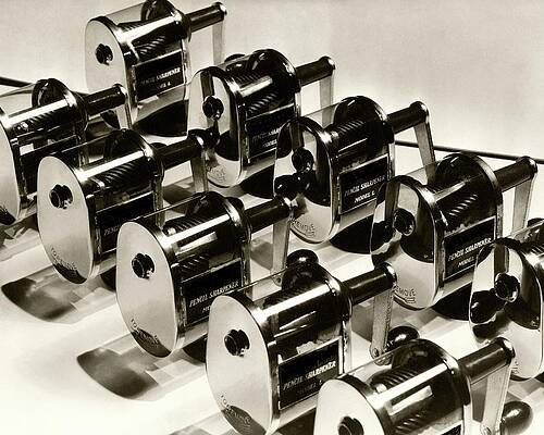 Wall Art featuring the photograph A Group Of Pencil Sharpeners by Lusha Nelson