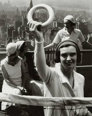 Women on Skyscraper Rooftop Photograph