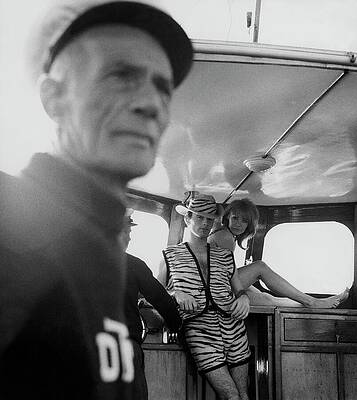 Wall Art featuring the photograph A Male Model And A Female Model Posing In A Cabin by Leonard Nones