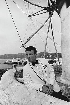 Greece Photograph - A Male Model Posing On A Terrace In Mykonos by Leonard Nones