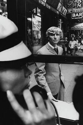 Man in a Suit on City Street Photograph