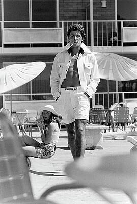 Man Walking at a Poolside Photograph