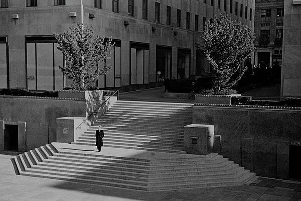 Man Descending Iconic Urban Steps Photograph