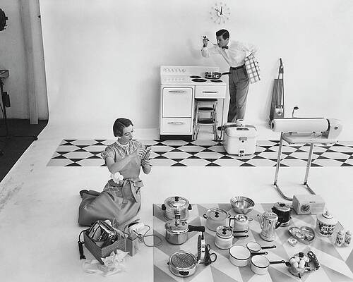 Wall Art featuring the photograph A Married Couple With Kitchen Appliances by Herbert Matter