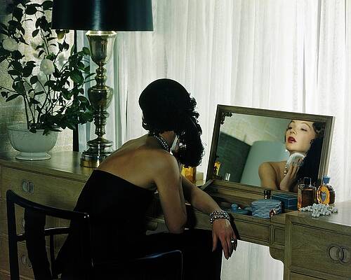 Wall Art featuring the photograph A Model Getting Ready In A Mirror by Herbert Matter