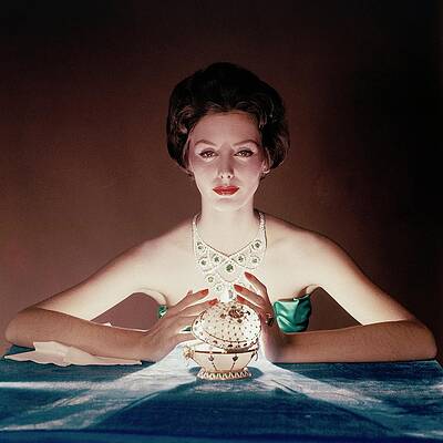 Illuminate Photograph - A Model Illuminated By A Faberge Egg by John Rawlings
