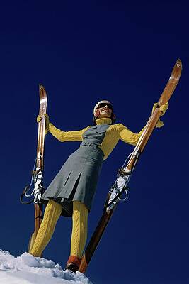 Mountain Photograph - A Model In A Ski Suit by Toni Frissell
