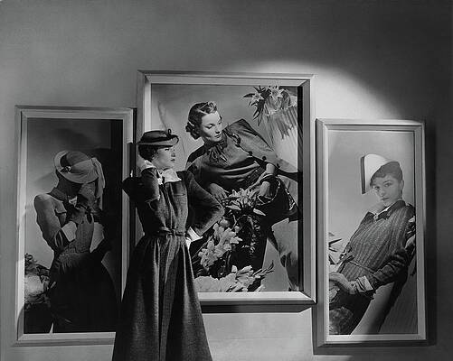 Sailor Wall Art featuring the photograph A Model In Front Of Photographs by Horst P. Horst