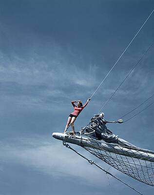 Woman Poses on Sailboat Bow Wall Art