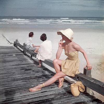 Vintage Beach Scene with Woman in Hat Wall Art