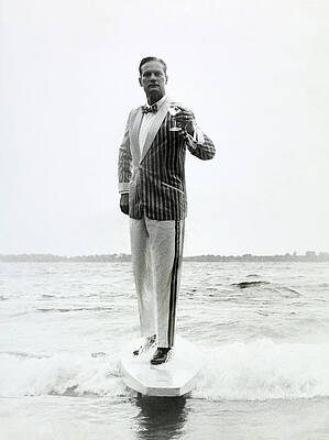 Man in Striped Suit on Surfboard Wall Art
