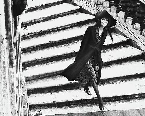 Model Walking Down Stairs in Rome Photograph