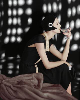Stylish Woman Sipping Martini Photograph