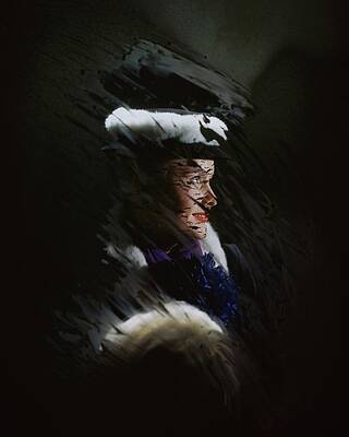 Wall Art featuring the photograph A Model Wearing A Coat And Hat by John Rawlings