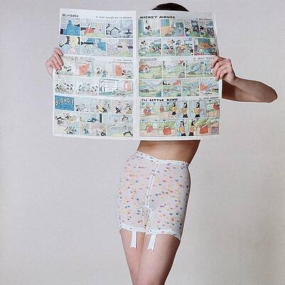Person Reading Newspaper in Underwear Wall Art
