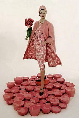 Necklace Photograph - A Model Wearing A Matching Pink Outfit Holding by William Bell