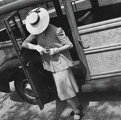 Lighting Wall Art featuring the photograph A Model Wearing A Maternity Suit by Toni Frissell