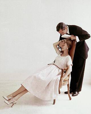 Elegant Couple in Vintage Setting Photograph