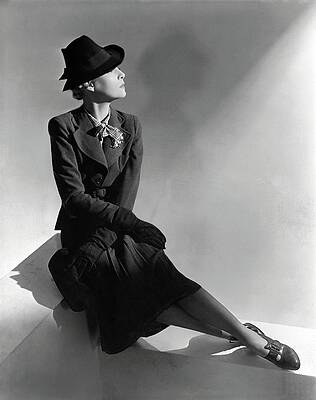 Crown Wall Art featuring the photograph A Model Wearing Molyneux And A Hat By Descat by Horst P. Horst