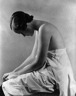 Wall Art featuring the photograph A Model With Her Eyes Closed by Lusha Nelson