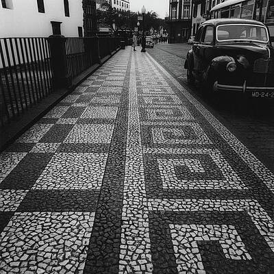 Geometric Sidewalk in a Vintage City Photograph
