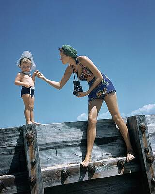 Woman with Child on Wooden Pier Wall Art