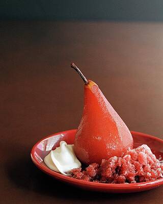 Fruit Photograph - A Poached Pear by Romulo Yanes