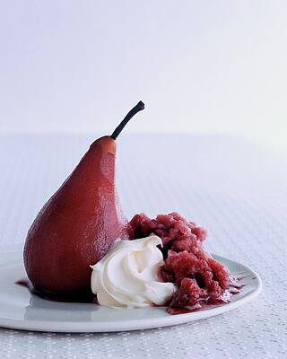 Fruit Photograph - A Poached Pear With Cream by Romulo Yanes