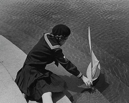 Teen Wall Art featuring the photograph A Portrait Of A Young Girl With A Sailboat by Lusha Nelson