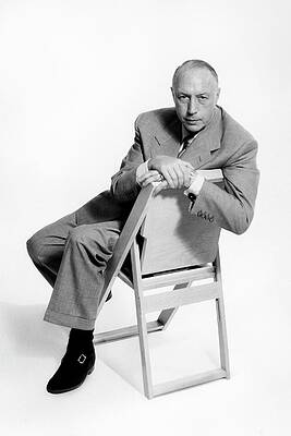 Wall Art featuring the photograph A Portrait Of Joseph Platt In A Wooden Chair by Herbert Matter