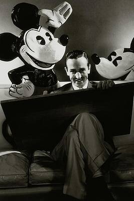 Man with Mickey Mouse Figures Wall Art