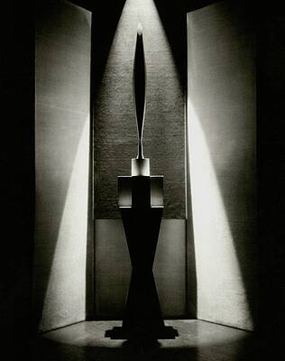 Sculpture in Dramatic Lighting Photograph
